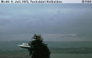 1975年07月09日_P0064#_拍摄于：Fuchsbüel-Hofhalden_Semjase驾驶她的光船围绕一颗14米高的Wettertanne飞行